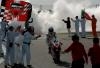 Troy Bayliss - 2006 WSB Champion; take the thanks of staff and fans at the last round. Copyright of Ducati Corse Press.