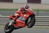 Casey Stoner celebrates a wonderful win in Qatar