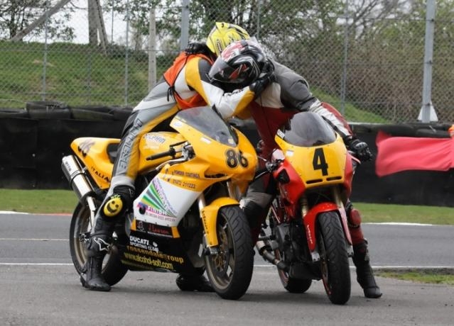 Matt Trayner (86) and Dom Clegg (4) sportingly celebrate Dom's win in Desmo Due.